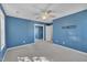 Comfortable bedroom with carpeted floors, ceiling fan, and closet, offering ample space and convenience at 2037 Summer Shire Way, Raleigh, NC 27604