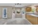 Bright and airy breakfast nook featuring a bay window, a back door and seamless transition into the kitchen at 2037 Summer Shire Way, Raleigh, NC 27604