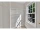 Walk-in closet with natural light and built-in shelving at 2037 Summer Shire Way, Raleigh, NC 27604
