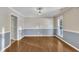 Dining room showcasing hardwood floors, neutral paint, and chair rail molding at 2037 Summer Shire Way, Raleigh, NC 27604