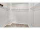 Spacious walk-in closet with carpeted floor and wire shelving for ample storage solutions at 2037 Summer Shire Way, Raleigh, NC 27604