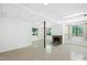 Finished basement featuring a fireplace and windows at 205 Bruton Dr, Chapel Hill, NC 27516