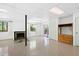 Finished basement featuring a fireplace, windows, and outdoor access at 205 Bruton Dr, Chapel Hill, NC 27516