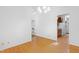 Bright dining area with hardwood floors, modern lighting, with open floor plan at 205 Bruton Dr, Chapel Hill, NC 27516