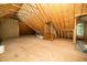 Unfinished attic space with exposed wood beams and potential for customization at 206 Lilliput Ln, Wake Forest, NC 27587