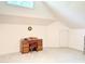 Bonus room featuring carpet, high ceilings, a desk, and a small window at 206 Lilliput Ln, Wake Forest, NC 27587