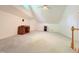 Large bonus room with high ceilings, carpeted floors, and a desk at 206 Lilliput Ln, Wake Forest, NC 27587