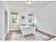 Bright bedroom with neutral decor, featuring hardwood floors and natural light at 210 Bennington Pkwy, Durham, NC 27713