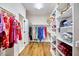 Spacious walk-in closet with custom shelving and racks for organized storage at 210 Bennington Pkwy, Durham, NC 27713