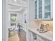 Open-concept design featuring dining room with modern furnishings, seamlessly connected to the kitchen at 210 Bennington Pkwy, Durham, NC 27713