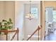 Hallway with chandelier and view into office at 210 Bennington Pkwy, Durham, NC 27713
