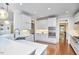 Bright kitchen with stainless steel appliances, white cabinetry, and spacious marble countertops at 210 Bennington Pkwy, Durham, NC 27713
