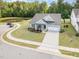 Attractive single-story home with pond access, manicured lawn and two car garage at 3034 Raddercrest Ct, Fuquay Varina, NC 27526