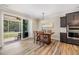 Cozy dining area with sliding door access to the screened porch at 3034 Raddercrest Ct, Fuquay Varina, NC 27526