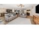 Open-concept living space flowing into the dining area and kitchen at 3034 Raddercrest Ct, Fuquay Varina, NC 27526