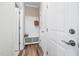 Convenient mud room with built-in bench and storage hooks at 3034 Raddercrest Ct, Fuquay Varina, NC 27526
