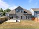 Well-maintained backyard with patio, modern fire pit, privacy fence, and easy access to the house at 325 Avery Glenn Way, Fuquay Varina, NC 27526