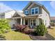 Exterior view of a two-story home with landscaped yard at 325 Avery Glenn Way, Fuquay Varina, NC 27526