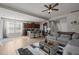 Bright, open-concept living room and kitchen offers a seamless flow and enhances the sense of space at 325 Avery Glenn Way, Fuquay Varina, NC 27526