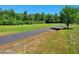 A vacant lot, showcasing the landscape and greenery at 33 Versailles Ln, Pittsboro, NC 27312