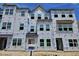 New construction townhome with a modern design and many windows in a desirable community at 348 Chesapeak Commons St # 137, Garner, NC 27529
