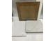 Interior finishes include taupe cabinets with light quartz countertops and white tile flooring at 348 Chesapeak Commons St # 137, Garner, NC 27529