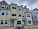 Newly constructed townhomes with large windows offering plenty of natural light and modern designs at 364 Chesapeak Commons St # 133, Garner, NC 27529