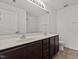 Bathroom featuring a double vanity and large mirror at 3816 Mike Levi Ct, Raleigh, NC 27610