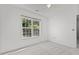 Carpeted room with natural light and an outdoor view at 3816 Mike Levi Ct, Raleigh, NC 27610