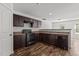 Kitchen featuring stainless steel appliances, ample counter space, and luxury vinyl plank flooring at 3816 Mike Levi Ct, Raleigh, NC 27610