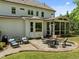 Backyard patio features comfortable seating perfect for outdoor entertaining near lush landscaping at 3913 Orchard Point Ct, Apex, NC 27539