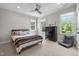 Bright bedroom with ample natural light, neutral walls, and comfortable furnishings at 3913 Orchard Point Ct, Apex, NC 27539