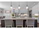 This spacious kitchen has an expansive island, stainless steel appliances, and plenty of cabinet space at 3913 Orchard Point Ct, Apex, NC 27539
