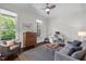 Comfortable living room with abundant natural light and stylish furniture at 3913 Orchard Point Ct, Apex, NC 27539