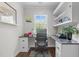Bright office space with custom built-in shelving and desk area at 3913 Orchard Point Ct, Apex, NC 27539