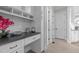 Office nook with modern white cabinets and granite countertop at 3913 Orchard Point Ct, Apex, NC 27539