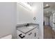 Bathroom vanity featuring modern fixtures and contrasting countertop at 4009 Yates Mill Pond Rd, Raleigh, NC 27606