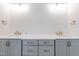 Bathroom featuring double vanity, marble countertops, and bronze fixtures at 4009 Yates Mill Pond Rd, Raleigh, NC 27606