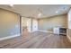 Expansive bonus room boasts wet bar, ceiling fan and durable floors at 4009 Yates Mill Pond Rd, Raleigh, NC 27606