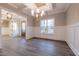 Dining room with chandelier, wainscoting and hardwood floors at 4009 Yates Mill Pond Rd, Raleigh, NC 27606