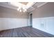 Dining room with chandelier, decorative molding and hardwood floors at 4009 Yates Mill Pond Rd, Raleigh, NC 27606