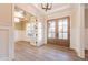 Beautiful foyer featuring double doors, hardwood floors, and recessed lighting at 4009 Yates Mill Pond Rd, Raleigh, NC 27606