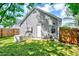 Well-maintained backyard featuring a generator and partial fencing for security and convenience at 4114 Sudbury Rd, Durham, NC 27704