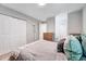 Bright bedroom with fresh walls, soft pillows, and ample closet space at 4114 Sudbury Rd, Durham, NC 27704