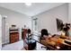 Office space with custom wooden desk and shelving units, natural light at 4114 Sudbury Rd, Durham, NC 27704