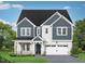 Charming two-story home showcasing a well-manicured lawn and a covered entryway leading to an attached two-car garage at 452 Golden Dragonfly St, Wake Forest, NC 27587