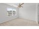 Bedroom featuring neutral carpet and a ceiling fan at 4718 Sleepy Falls Run, Knightdale, NC 27545