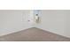 Neutral bedroom featuring carpet and a window at 50 Rosewood Ln, Youngsville, NC 27596