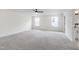 Large bedroom featuring lots of natural light and ceiling fan, offering a comfortable retreat at 50 Rosewood Ln, Youngsville, NC 27596