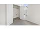 Walk-in closet with carpeted floor, white walls, and a window at 50 Rosewood Ln, Youngsville, NC 27596